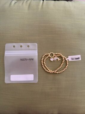 Alex and Ani Gold Beaded Triple Bracelet with Dolphin and Heart Charms